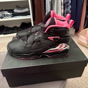 Black and Pink High-Top Jordan’s